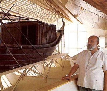 Ahmed Youssef with the resorted boat of Khufu in its museum at Giza