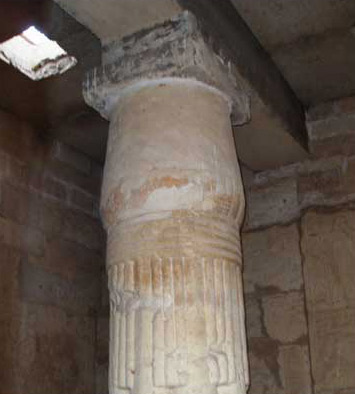 One of the ancient, Middle Kingdom columns within the portico