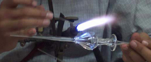 Heating glass to form the perfume bottle