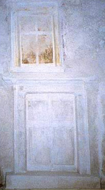 Loculi sealed with slabs painted on stucco with representations of doors and windws modeled on local houses of the Greek Period