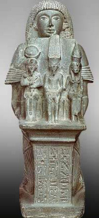 Statue of the First Priest of Amun, Ramessunakht, with the Theban Triad