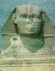 The damaged face of the Sphinx, smiling inscrutable smile. 