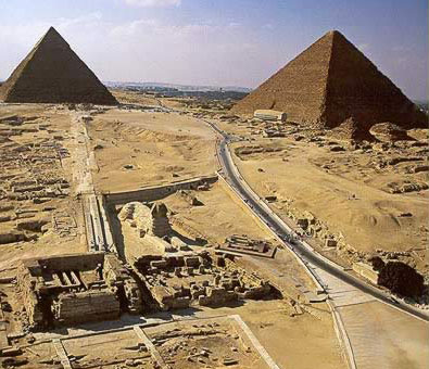 A view of the Giza Plateau with the Great Sphinx and its temples in the foreground